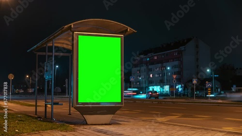 City street bus stop advertising billboard green screen mockup at night