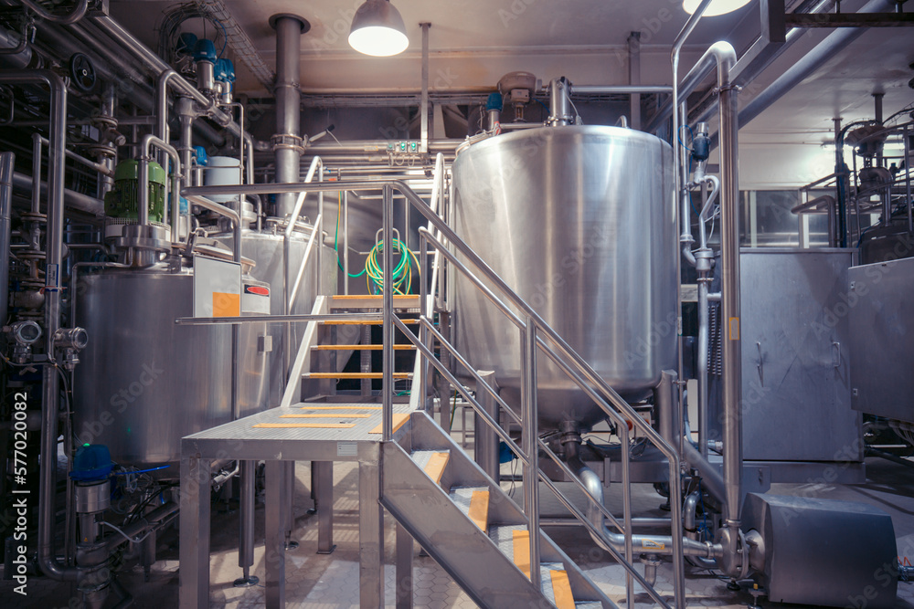 Modern milk cellar with stainless steel tanks Modern milk cellar with stainless steel tanks