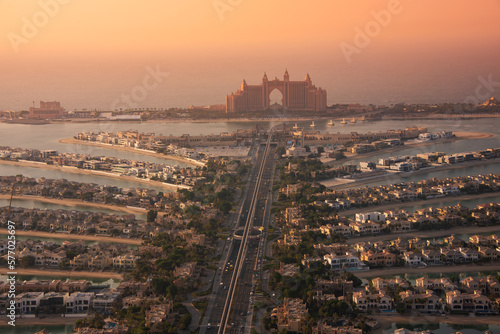 Tableau sur toile Palm Jumeirah island in Dubai on sunset, modern architecture, beaches and villas