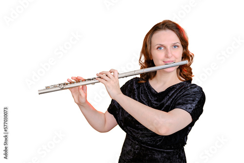 Fotografija Portrait of a woman musician with a flute on a studio isolated white background