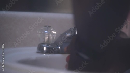 washing hands soap and water black man wrist watch