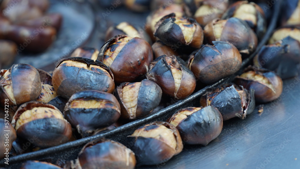 Roasted chestnuts on the market. Roasted chestnuts on the market.