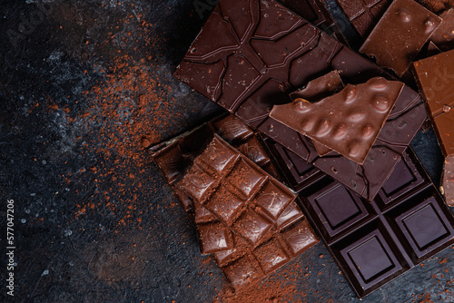 Chocolate bars on a dark background close-up