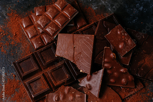 black and milk chocolate bars on a dark background