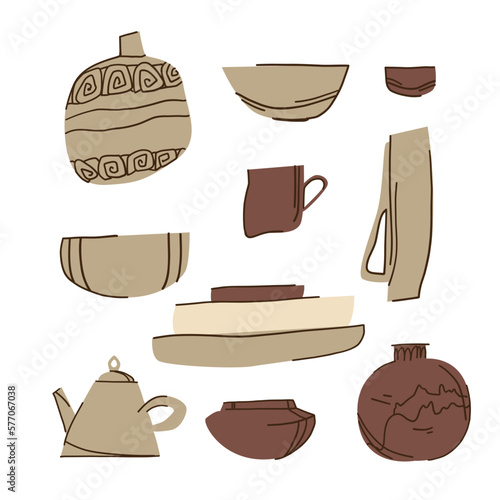 Set of ceramic dishes on a white background, clay vases, plates, cups, pottery master class