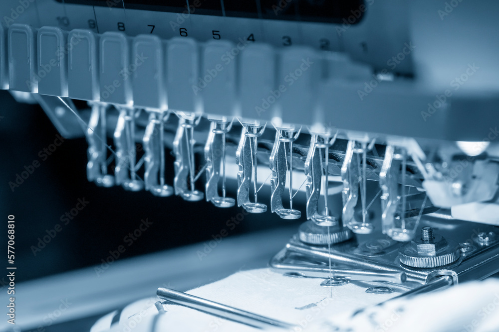 The industrial sewing machine in the light blue scene. The industrial sewing machine in the light blue scene.