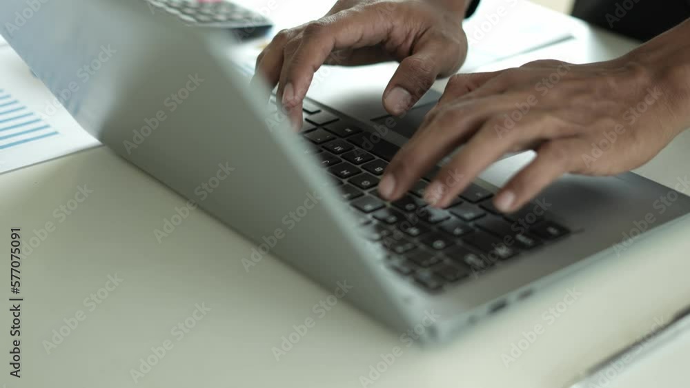 Modern business accountants are using laptops to check financial transactions using laptop software. Accounting concept tax and financial system. Modern business accountants are using laptops to check financial transactions using laptop software. Accounting concept tax and financial system.