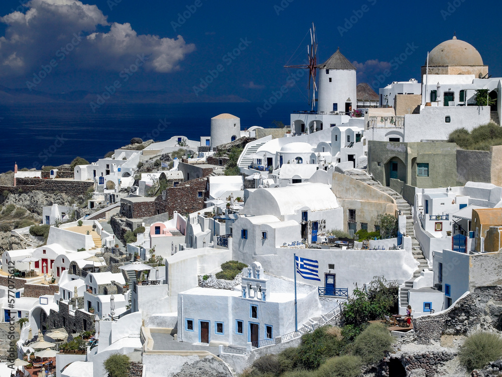 The town of Oia on the clifftop above the volcanic caldera on the Greek volcanic island of Santorini (Thira) in the southern Aegean Sea.