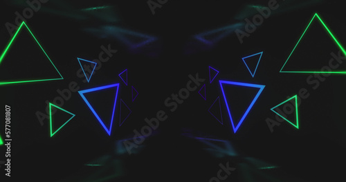Image of purple and green neon light triangles flickering on black background
