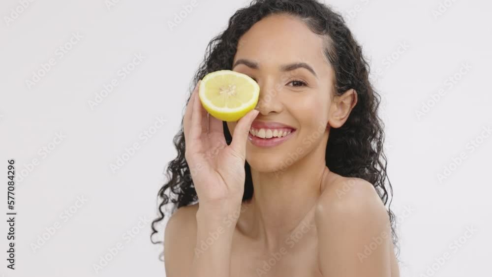 Beauty, woman and lemon fruit portrait for skincare in studio with ...