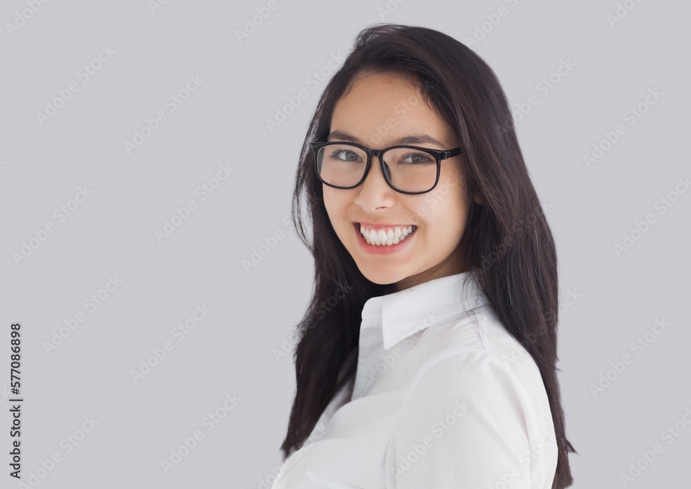 Portrait of asian woman smiling against copy space on pink background Portrait of asian woman smiling against copy space on pink background