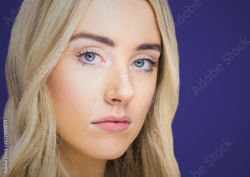 Portrait of caucasian woman against copy space on blue background