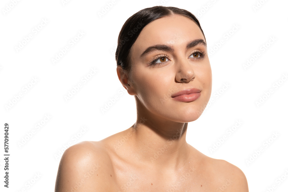 dreamy woman with naked shoulders looking away isolated on white. dreamy woman with naked shoulders looking away isolated on white.