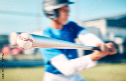 Baseball, game and man with training, speed and outdoor for exercise, blurry and wellness. Male athlete, guy and athlete with bat, health and hit a fast ball, practice and routine on field or workout photo