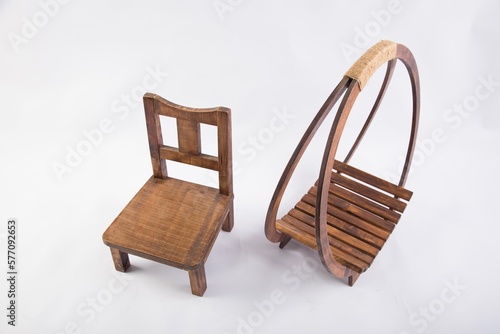 LIttle wooden beds and chairs Assorted baby photography props and toys 