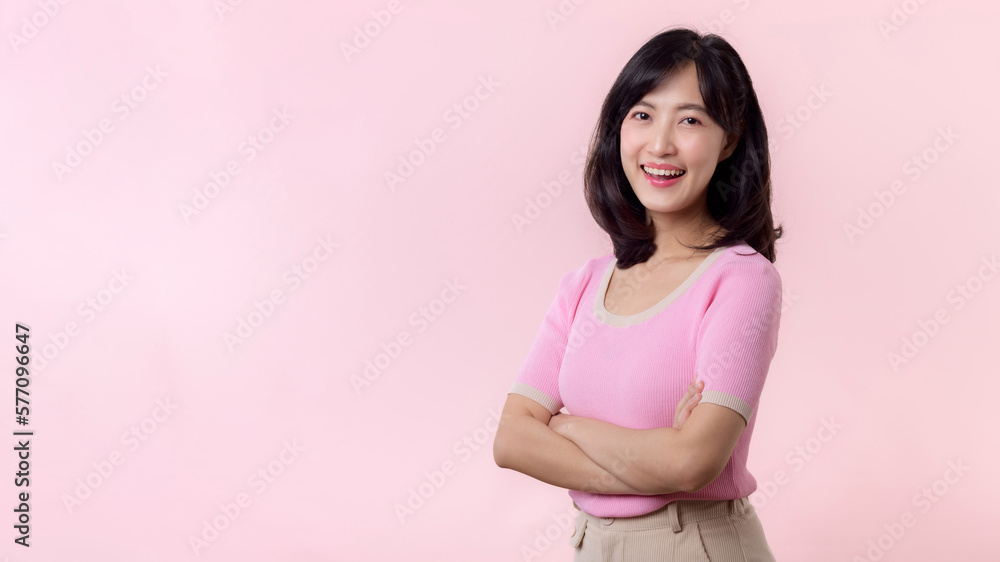 Portrait beautiful young asian woman model happy smile in pink sweater casual style fashion isolated on pink studio background. Attractive female person cheerful cute face portrait, Woman day concept. Portrait beautiful young asian woman model happy smile in pink sweater casual style fashion isolated on pink studio background. Attractive female person cheerful cute face portrait, Woman day concept.