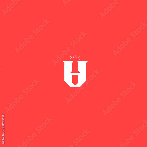 sword logo and shining letter u blend against red background