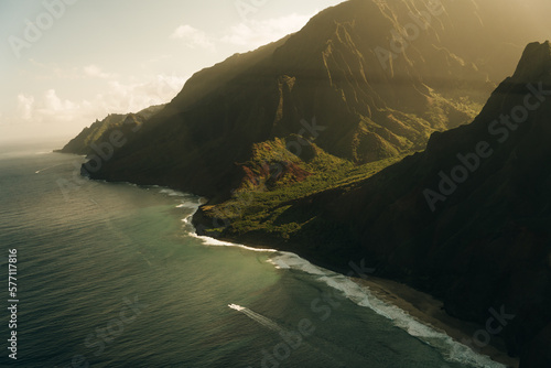 Hawaii Kauai Na Pali coast landscape aerial view from helicopter. Nature coastline dramatic mountains with secluded beach