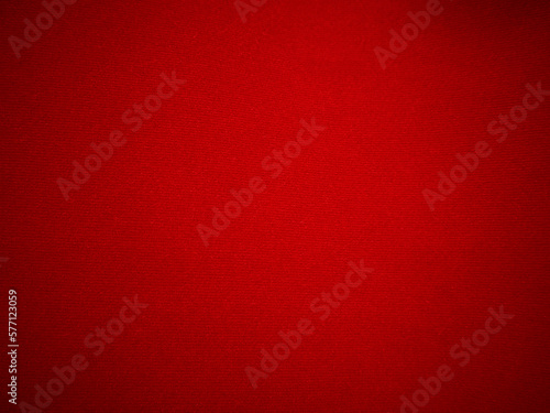 Red velvet fabric texture used as background. Empty red fabric background of soft and smooth textile material. There is space for text..