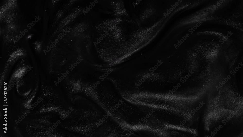 Liquid dark motion organic background. Shine glitter fluid metallic black color paint. Texture abstract acrylic cloud swirling underwater. Liquid dark motion organic background. Shine glitter fluid metallic black color paint. Texture abstract acrylic cloud swirling underwater.