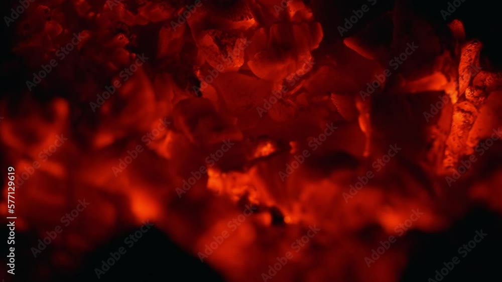 Texture of burning coals. Slow motion video. Texture of burning coals. Slow motion video.