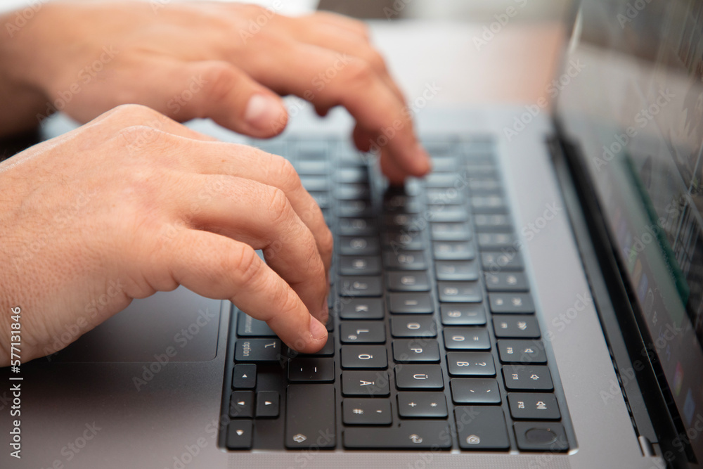 Closeup of hands typing on laptop Closeup of hands typing on laptop