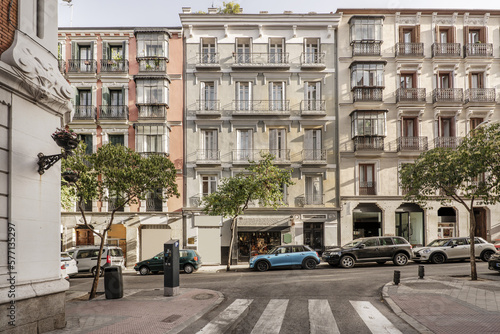 Billede på lærred Facades of centuries-old buildings in the center of the city of Madrid, Spain