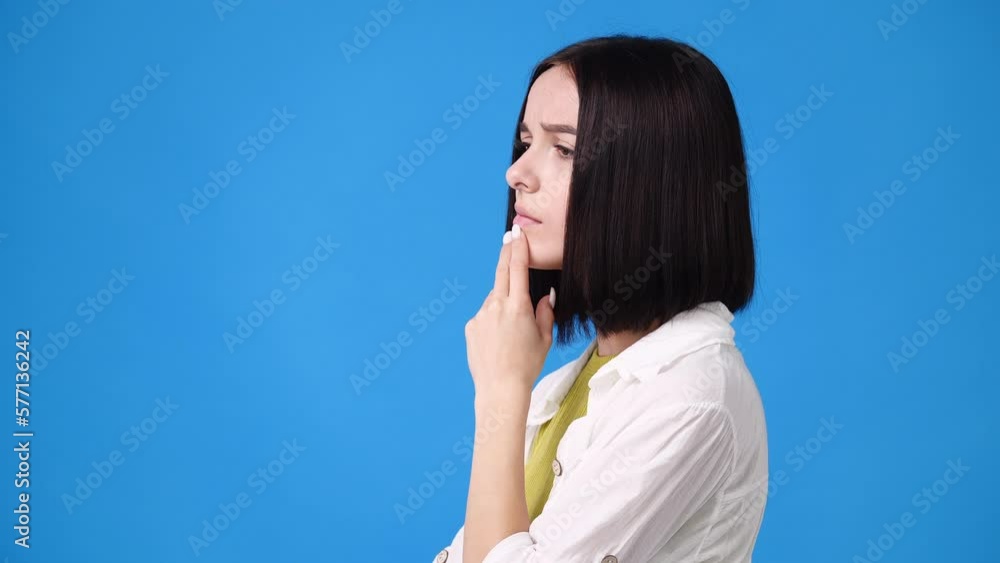 4k video of girl's facial expression on yellow background. 4k video of girl's facial expression on yellow background.