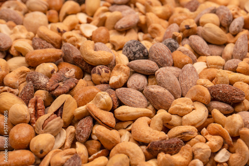 A group of almonds, pistachios, walnuts, macadamia, cashews.