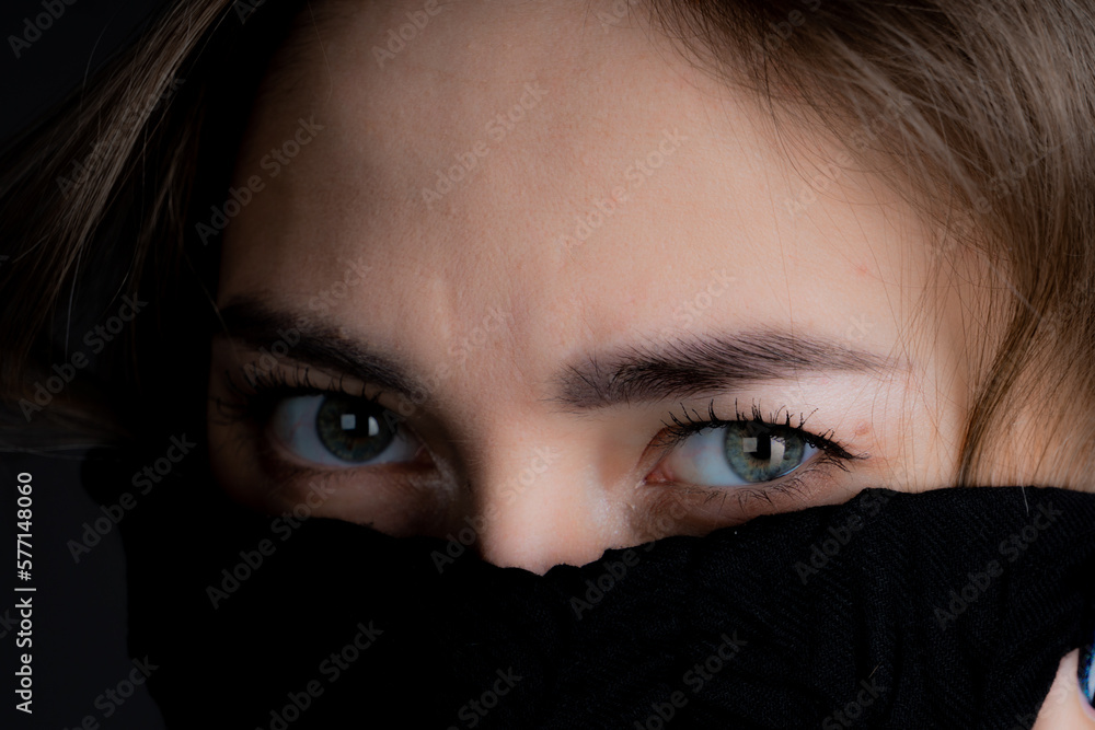 Portrait of a young girl on a black background Portrait of a young girl on a black background