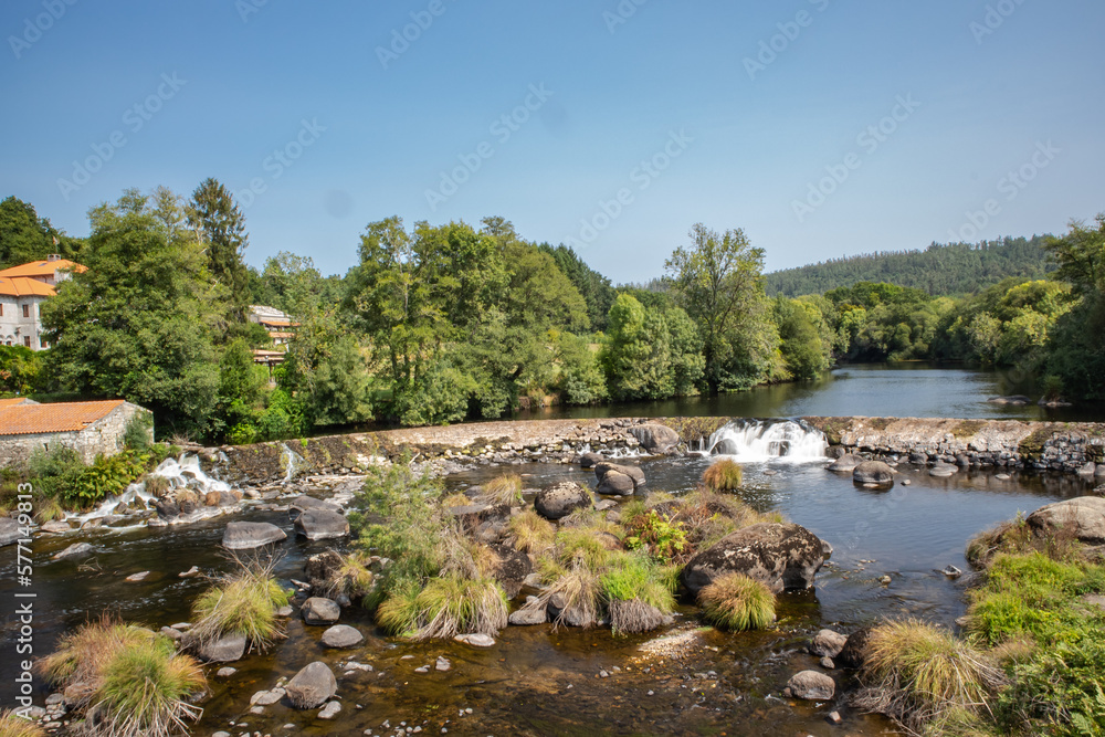 Calm river flowing through stones