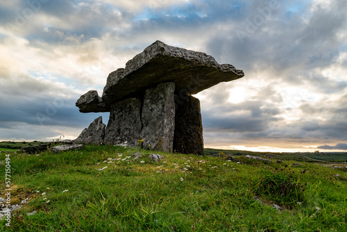 The iconic Poulnabrone dolmen, one of the most popular tourist attractions of the Burren National Park, County Clare, Ireland photo