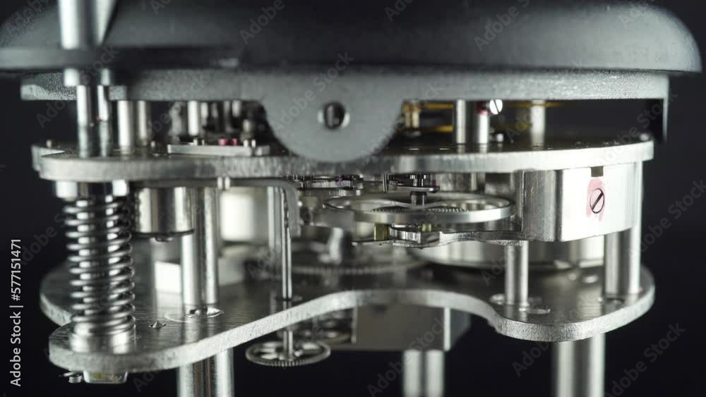 Rotation Of The Pendulum Of The Aviation Mechanical Chronometer Close Up. Rotation Of The Pendulum Of The Aviation Mechanical Chronometer Close Up.