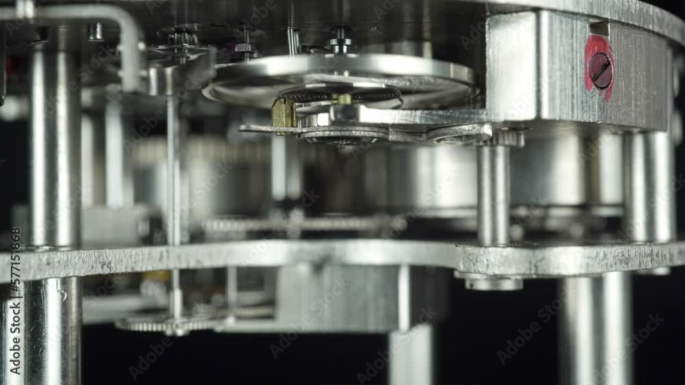 Rotation Of The Pendulum Of The Aviation Mechanical Chronometer Close Up. Rotation Of The Pendulum Of The Aviation Mechanical Chronometer Close Up.