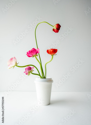 Flowers in coffee cup background