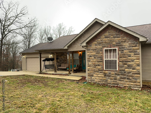 View of a typical suburban house with a stormy sky
