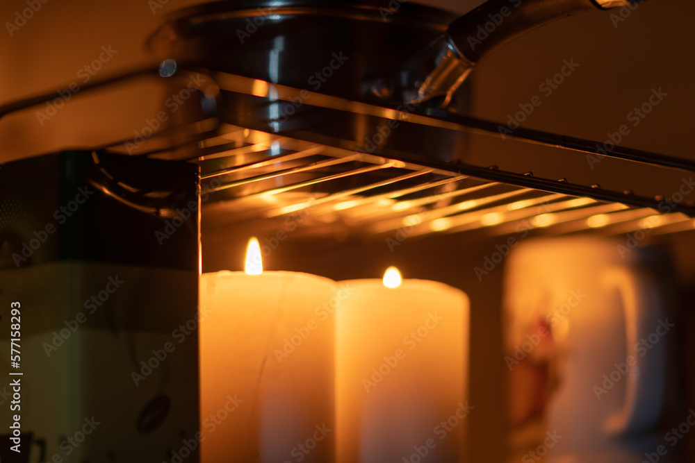 Pot of water heated by candles