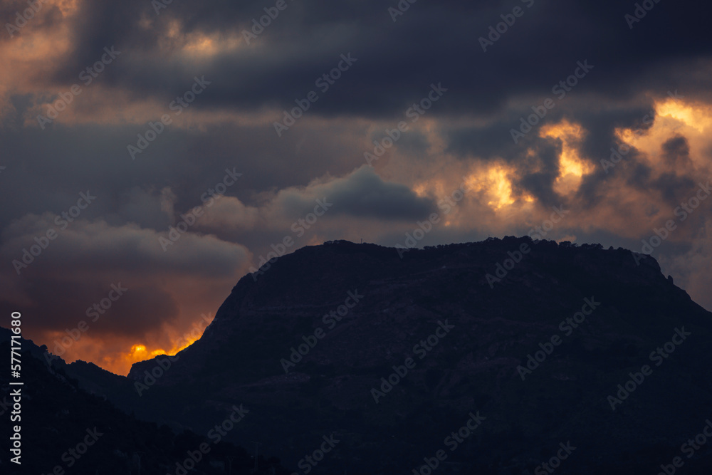 Radiant Sunset Among the Mountains