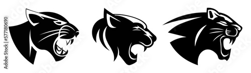 Set of silhouettes of predators isolated on a white background. Vector illustration of graphic silhouettes of the head of the feline family: panther, cheetah, jaguar in a cartoon style. Logo design.