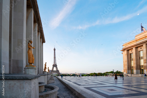 Paris Eiffel Tower and Trocadero square at sunrise in Paris, France. Eiffel Tower is one of the most iconic landmarks of Paris.