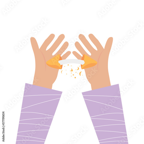 Human hands breaking fortune cookie on white background