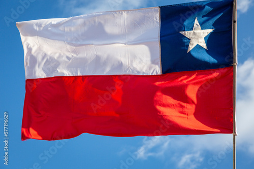 Obraz na płótnie Chile National Flag Waving on pole against sunny blue sky background w salonie