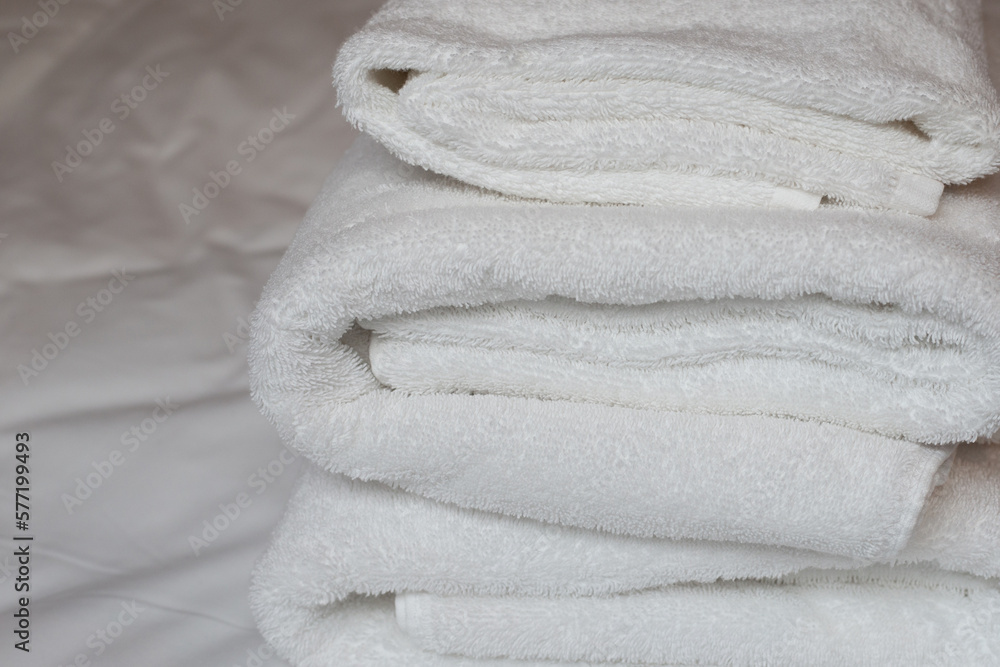 Stack of white towels, Bath towel Stack of white towels, Bath towel