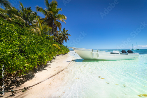 Boat and tropical beach in caribbean sea, Saona island, Dominican Republic