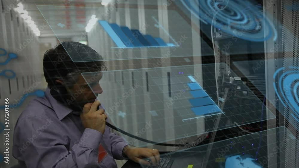 Animation of graphs and data processing over caucasian man on phone working in server room Animation of graphs and data processing over caucasian man on phone working in server room