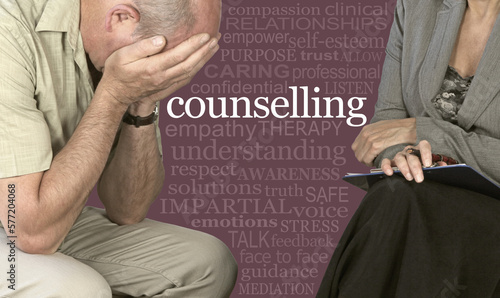 Take your troubles to a Counseling Session and get help Word Cloud Concept - male with head in hands sat beside female counselling therapist with a relavent word cloud between 
 photo