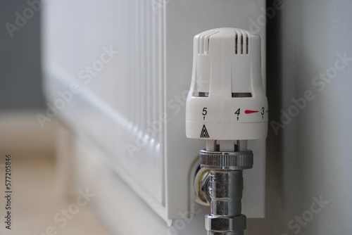 Close up of fully open home radiator thermostat © Marcin Rogozinski