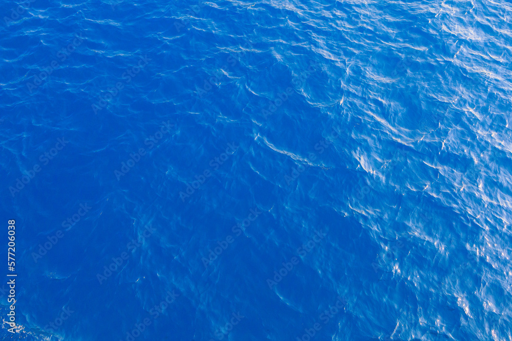 Very nice sea water background or backdrop with selective focus. Small waves of natural water surface texture. Very nice sea water background or backdrop with selective focus. Small waves of natural water surface texture.