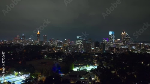 Wallpaper Mural View from above of brightly illuminated high skyscraper buildings in downtown district of Atlanta city in Georgia, USA. American megapolis with business financial district at night Torontodigital.ca
