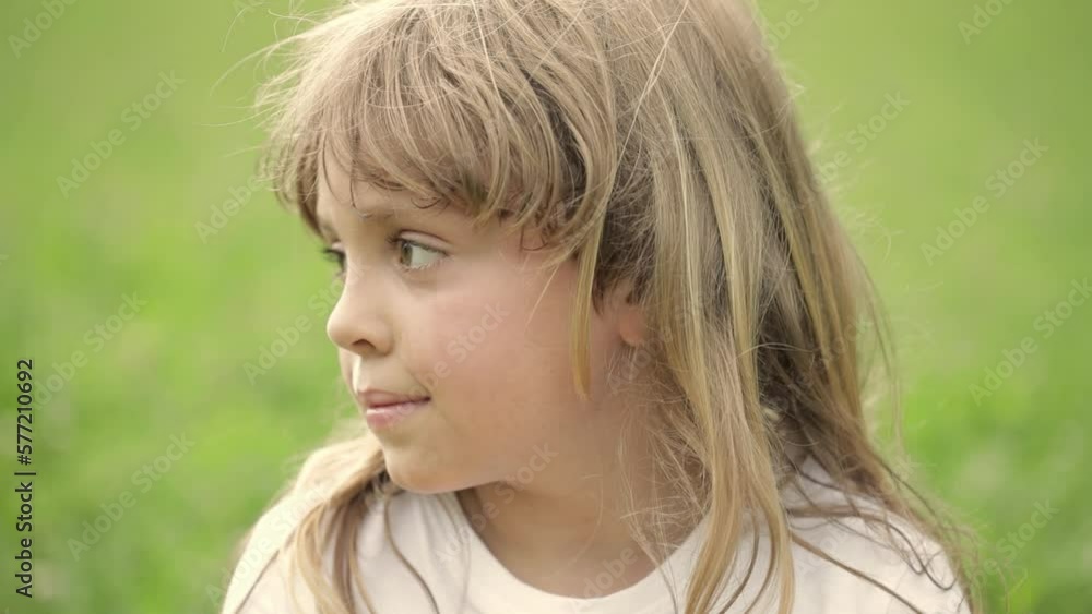 Closeup of a caucasian girl in the field. Closeup of a caucasian girl in the field.